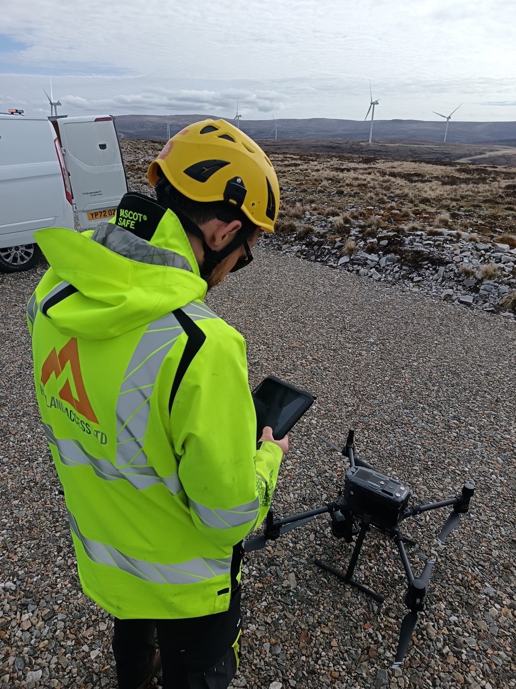 Field technician using a tablet on site